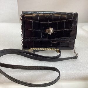 Brighton Wallet Crossbody in a black with Crock Embossed pattern.